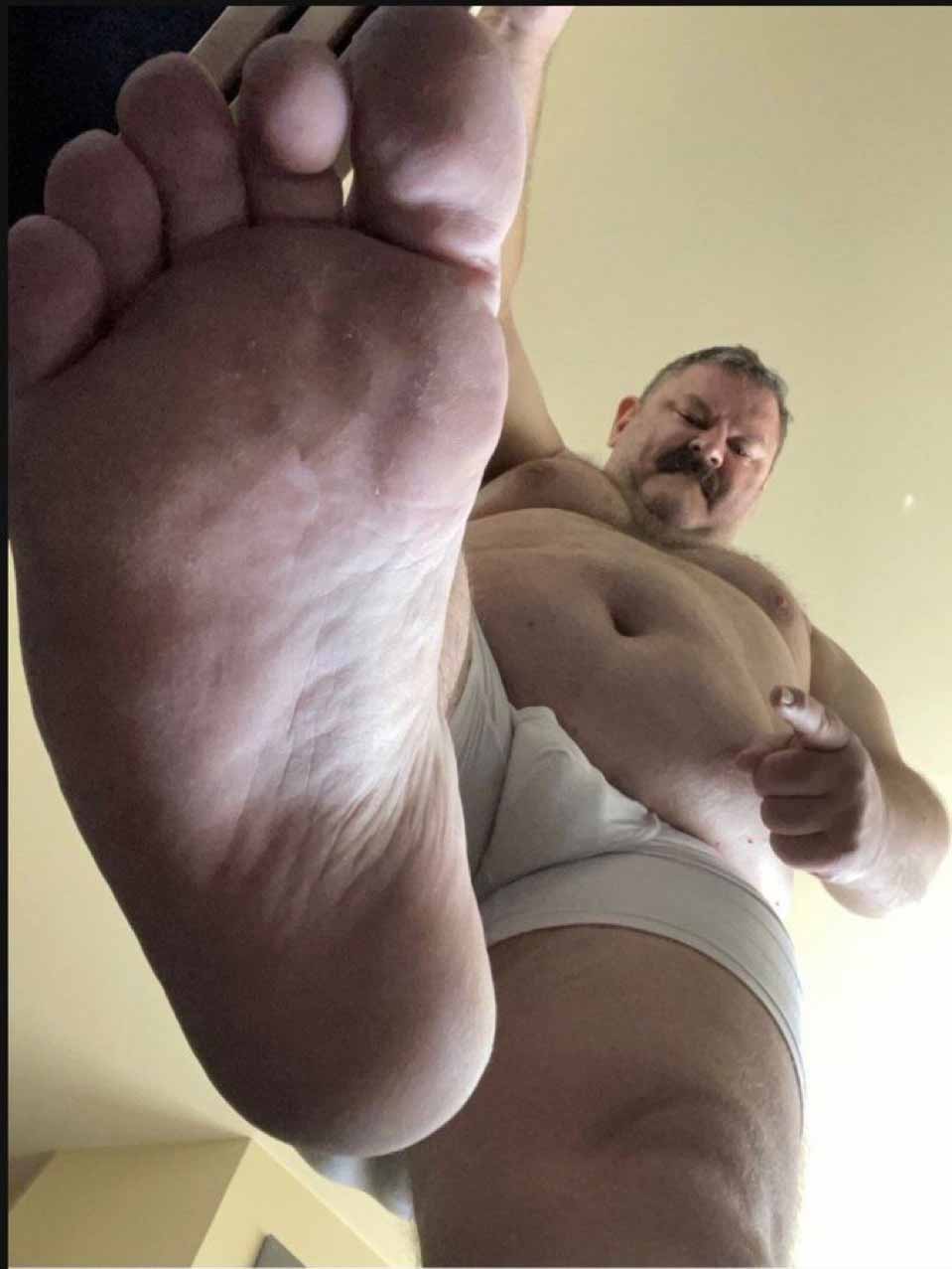 Drool over beefy male soles