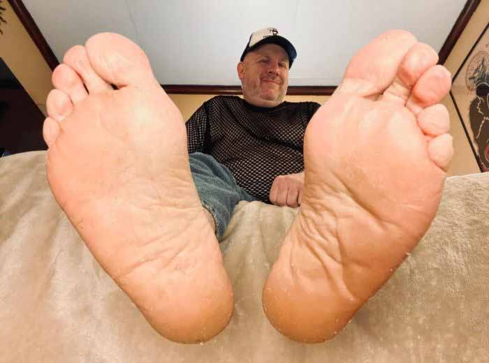 Drool over wrinkled dad feet soles